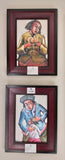 Pumpkin Woman and Woman with Child -Framed painting hanging on a wall
