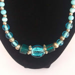 Beaded Ladies Necklace Blue White Metal Beads Close up of pendant