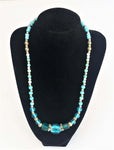 Beaded Ladies Necklace Blue White Metal Beads on jewelry stand