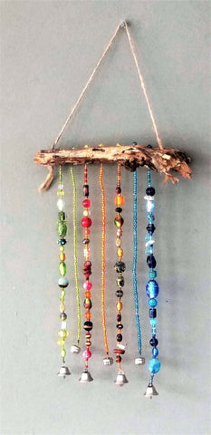 Beaded Suncatcher with blue, red and green glass beads on jacaranda wood