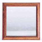 Decor mirror in a brown moulded wooden frame